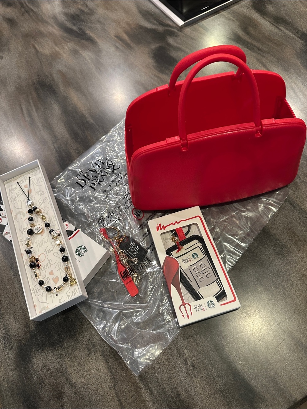 Devil Wears Prada Red Top-Handle Tote Bag and accessories